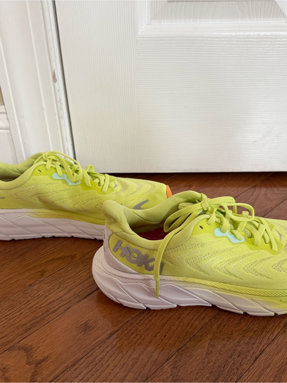 Women’s Hoka Arahi 6 Neon Yellow Athletic Running Shoes with Orange Accents - Picture 3 of 9